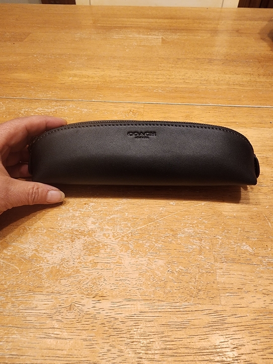 Coach Handbags - Coach Leather Pencil Case in black featuring a smooth leather finish